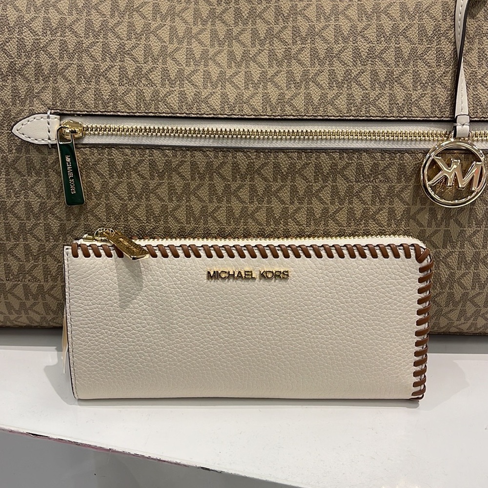 Michael Kors Jet Set Travel Large Pebble Leather Quarter-Zip Wallet
NWT